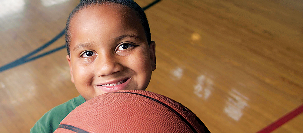 boy holding a basketball