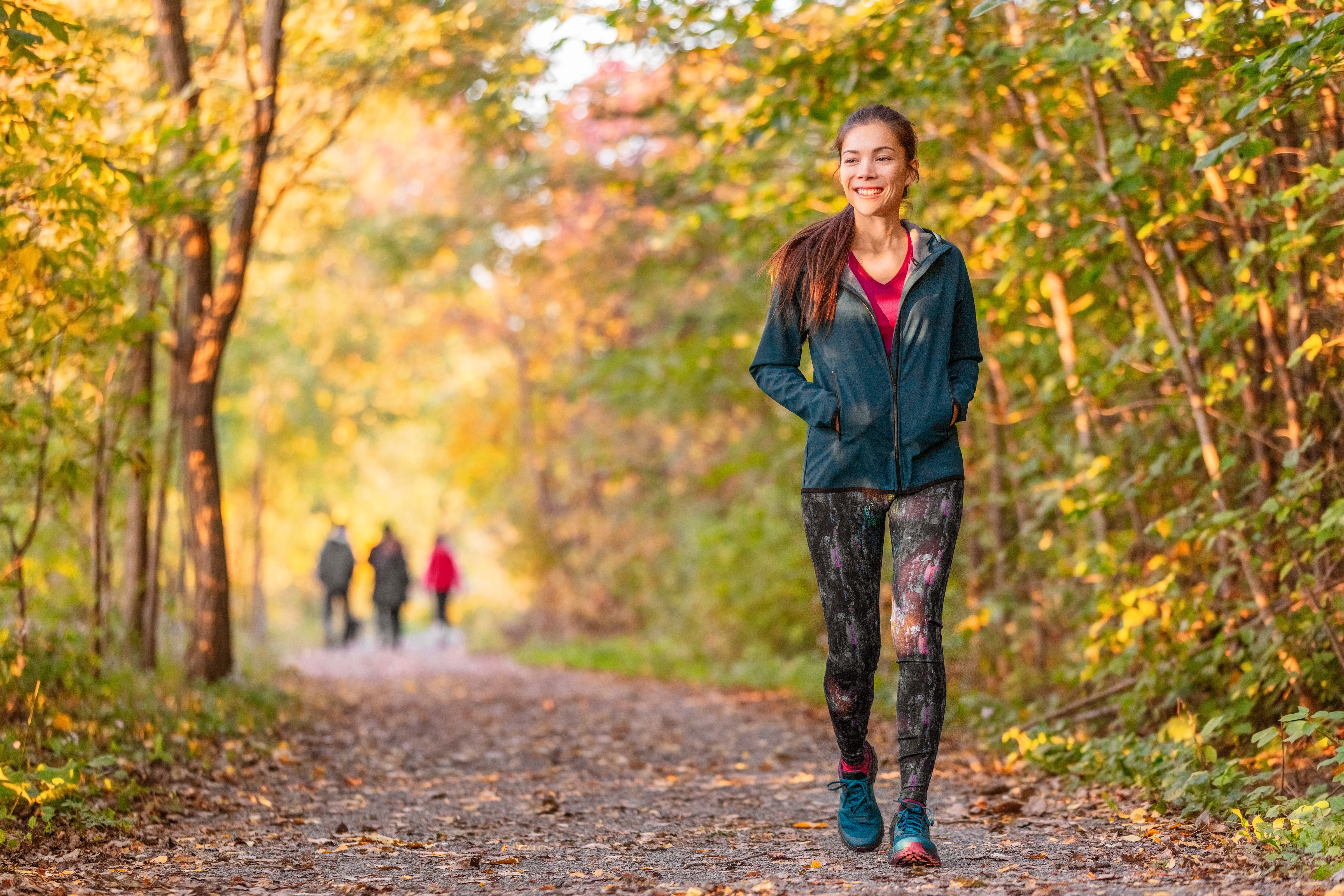 happy woman walking in nature