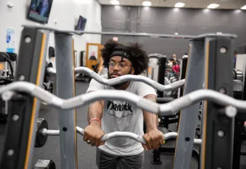 man at YMCA working out