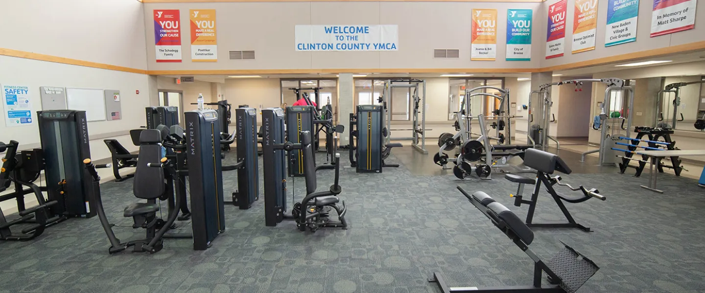 Weight machines throughout room. Wide paths between equipment.