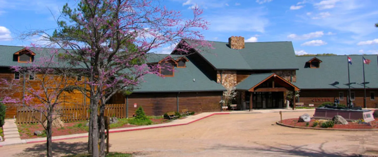front exterior view of ymca trout lodge in the spring