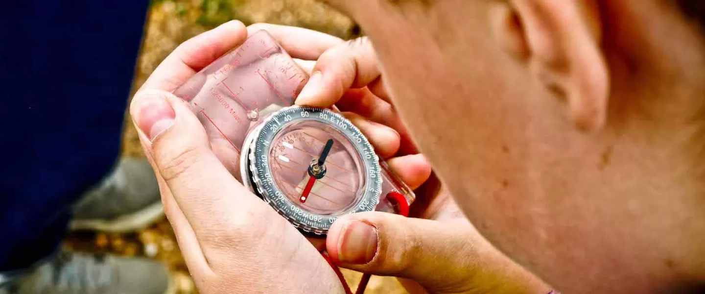 Student learning how to use a campus as part of an outdoor education program activity 