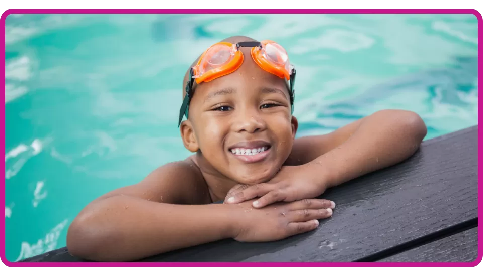 little boy swimming at the YMCA