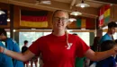 Thumbnail: Female counselor in red staff shirt