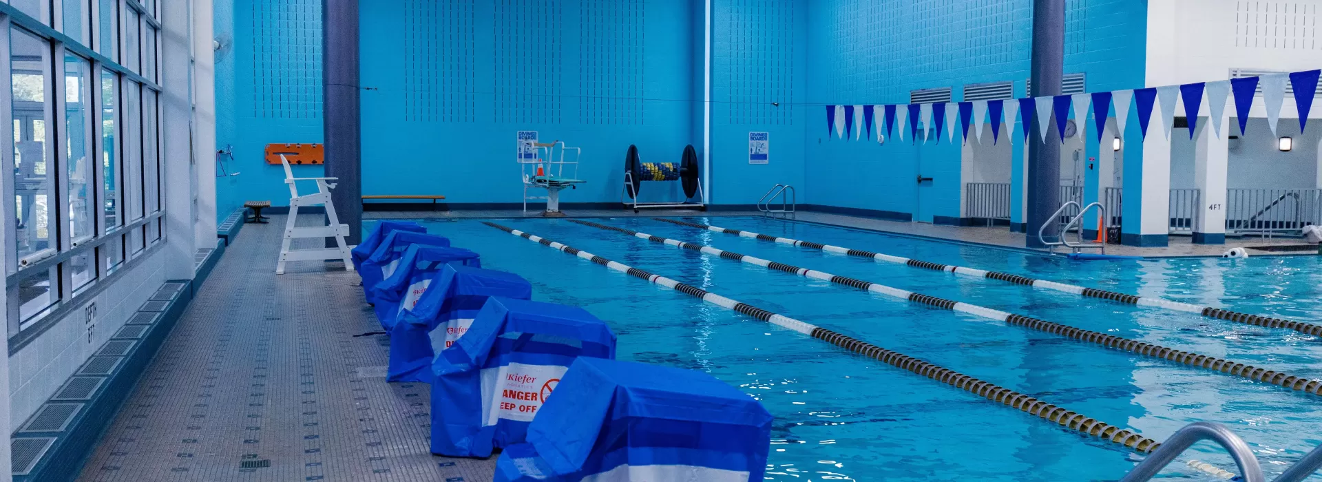 Pool with multiple lap lanes. Separate whirlpool beside main pool