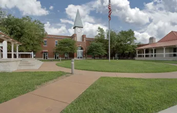 Ste Genevieve County YMCA Community Center Building Exterior photo with courtyard walkway