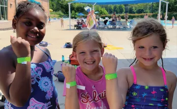 YMCA Go for Green Program Participants Safety Around Water Initiative with Green Swim Bands